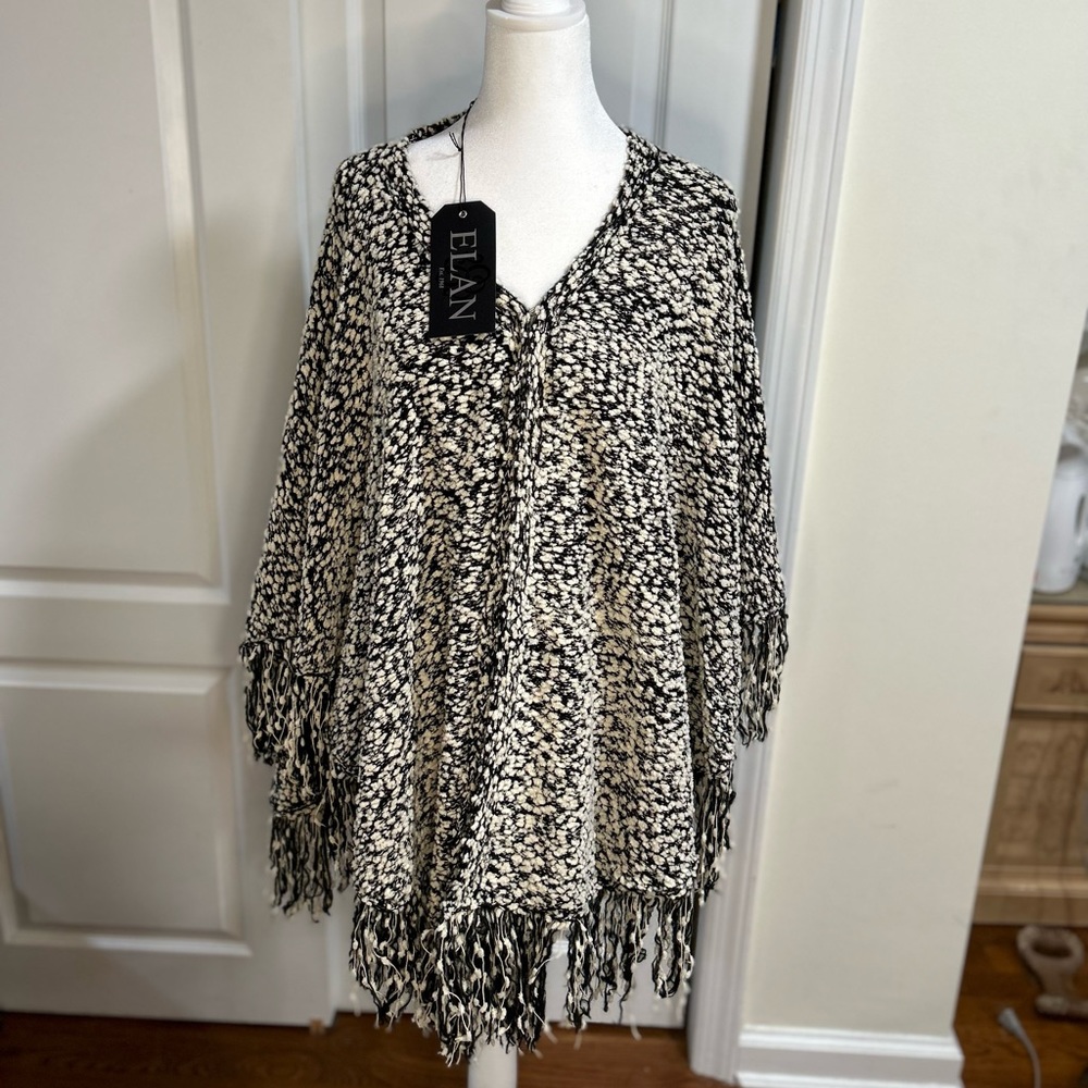 Beautiful ELAN SHAWL in black and white knit with a hook and eye closure